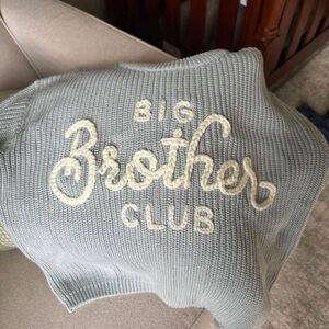 Big Brother Club knit sweater
